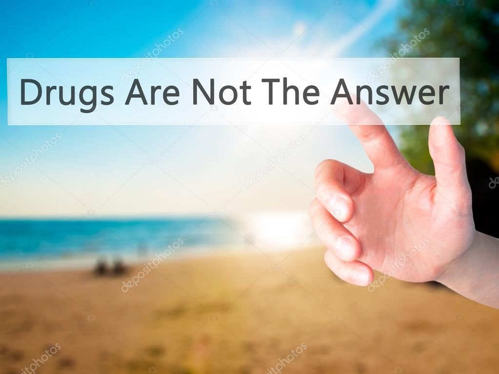 Drugs Are Not The Answer Hand pressing a button on blurred bac Stock