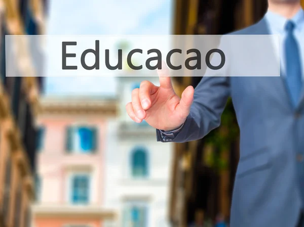 Educaco (Bildung auf portugiesisch) - Geschäftsmann Handpresse — Stockfoto