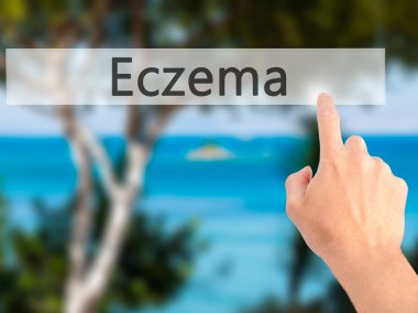 Eczema - Hand pressing a button on blurred background concept on clipart