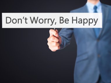 Merak etme, Be Happy - işadamı el işareti tutarak