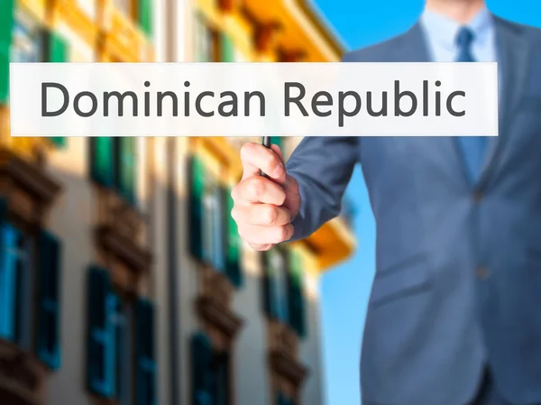 Доминиканская Республика - Предприниматель держит табличку — стоковое фото
