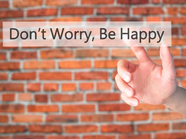 , Be Happy - bulanık backgr üzerinde bir düğmeye basarak el merak etme — Stok fotoğraf