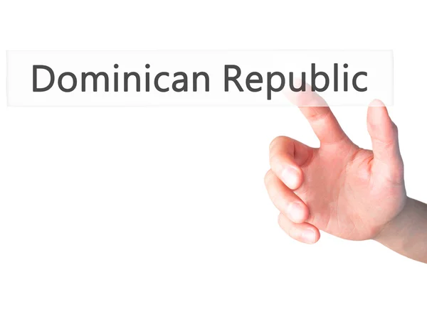 Доминиканская Республика - вручную нажимая кнопку на размытом бэкгрунте — стоковое фото