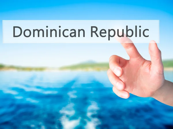 Домініканська Республіка - рукою, натисненням кнопки розмиті backgroun — стокове фото