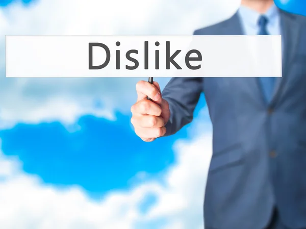 Dislike - Businessman mână care ține semn — Fotografie, imagine de stoc