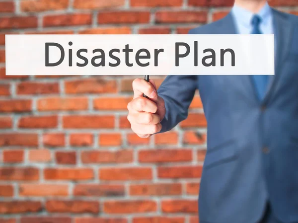 Disaster Plan - Businessman hand holding sign — Stock Photo, Image