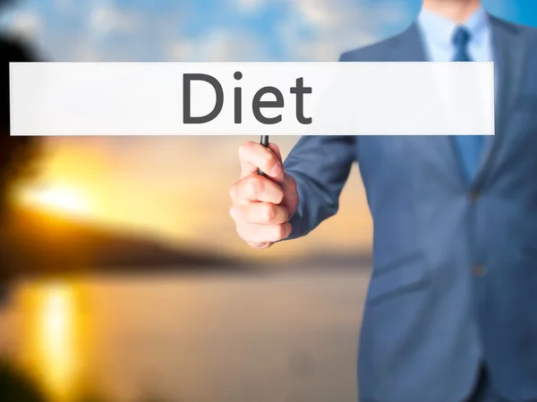 Diet - Businessman hand holding sign — Stock Photo, Image