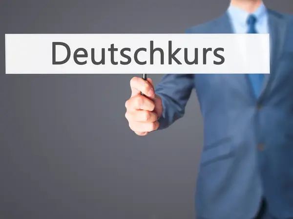 Deutschkurs (tysken jagar i tysk)-affärsmannen räcker innehav — Stockfoto