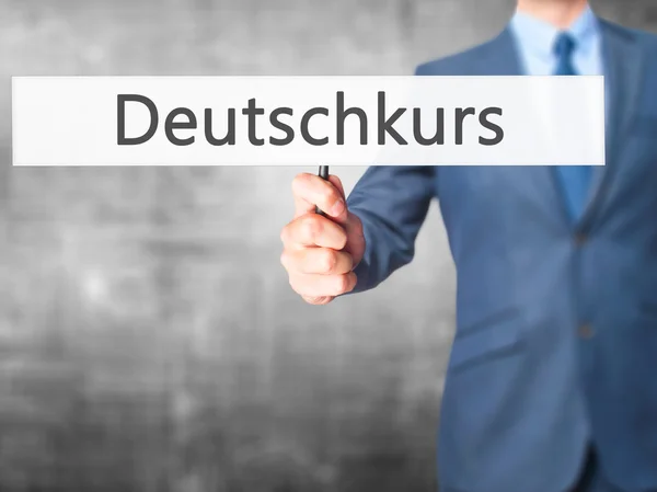 Deutschkurs (немецкий курс на немецком языке) - Бизнесмен ручной — стоковое фото
