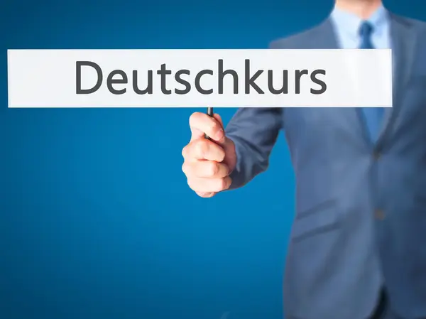 Deutschkurs (tysken jagar i tysk)-affärsmannen räcker innehav — Stockfoto