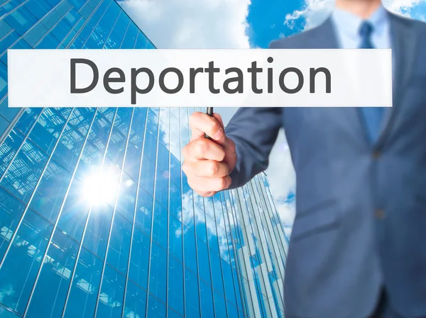 Deportación - Empresario mano sosteniendo cartel — Foto de Stock