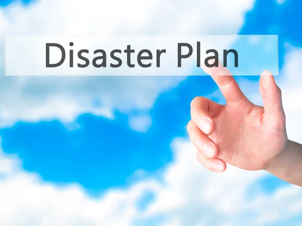 Disaster Plan - Hand pressing a button on blurred background con — Stock Photo, Image