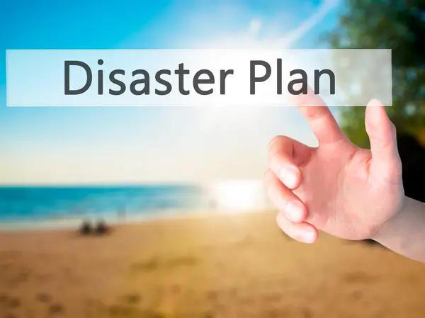 Disaster Plan - Hand pressing a button on blurred background con — Stock Photo, Image