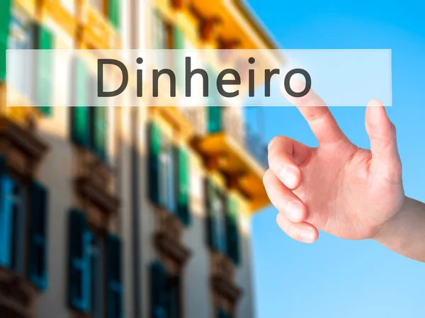 Dinheiro (Para Portekizce) - El bulanık bir düğmeye basarak — Stok fotoğraf