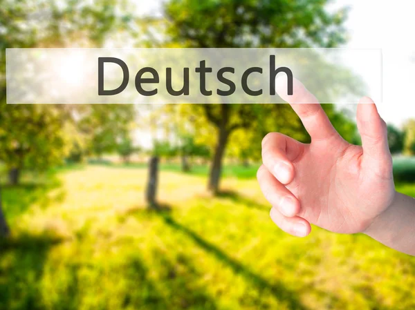 Deutsh (ドイツのドイツ語) - 手をぼやけて ba 上ボタンを押すと — ストック写真