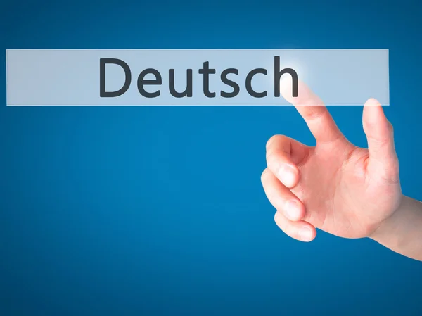 Deutsh (немецкий по-немецки) - нажатие кнопки на размытой бра — стоковое фото
