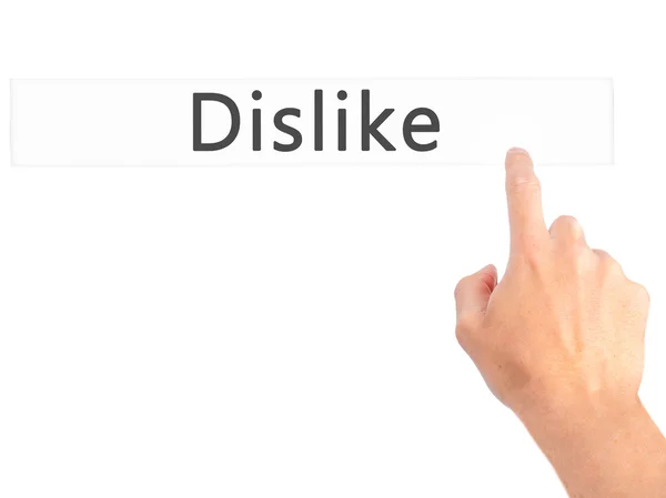 Dislike - Hand pressing a button on blurred background concept o — Stock Photo, Image