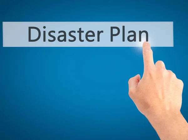 Disaster Plan - Hand pressing a button on blurred background con — Stock Photo, Image