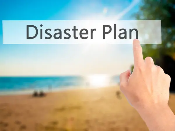 Disaster Plan - Hand pressing a button on blurred background con — Stock Photo, Image