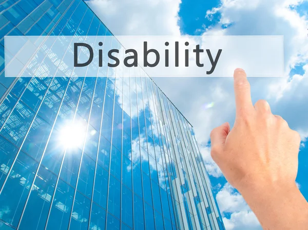 Disability - Hand pressing a button on blurred background concep — Stock Photo, Image