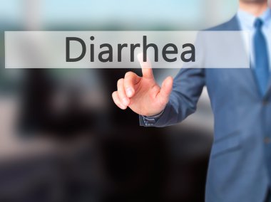 İshal - dokunmatik ekranda düğmeye işadamı el