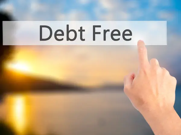 Debt Free - Appuyer à la main sur un bouton sur le concept de fond flou — Photo