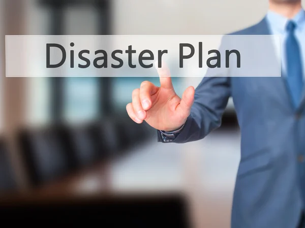 Disaster Plan - Businessman hand pushing button on touch screen — Stock Photo, Image