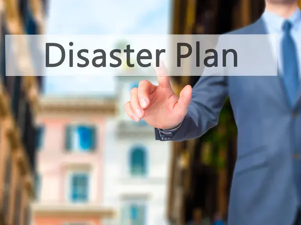 Disaster Plan - Businessman hand pushing button on touch screen — Stock Photo, Image