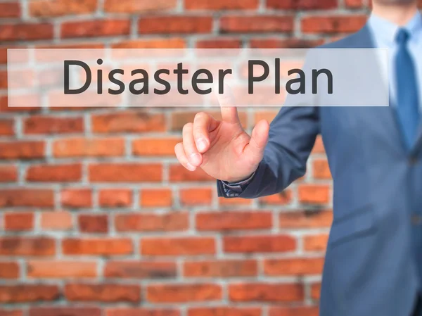 Disaster Plan - Businessman hand pushing button on touch screen — Stock Photo, Image