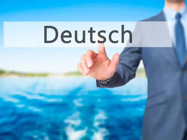 Deutsh (tyska på tyska) - affärsman hand trycka på knappen på t — Stockfoto