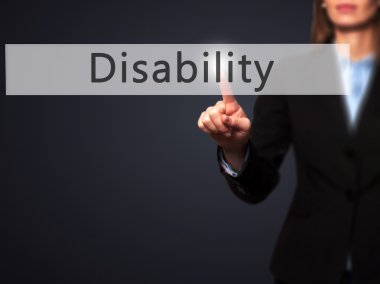 Engellilik - İş kadını push touch ekranında işaret parmağı