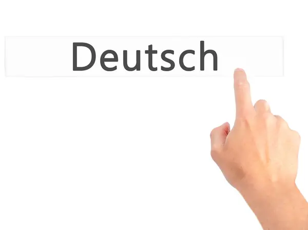 Deutsh (German in German) - Hand pressing a button on blurred ba — Stock Photo, Image