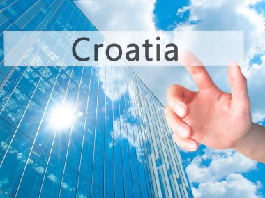 Hırvatistan - arka plan bulanık kavramı o üzerinde bir düğmeye basarak el
