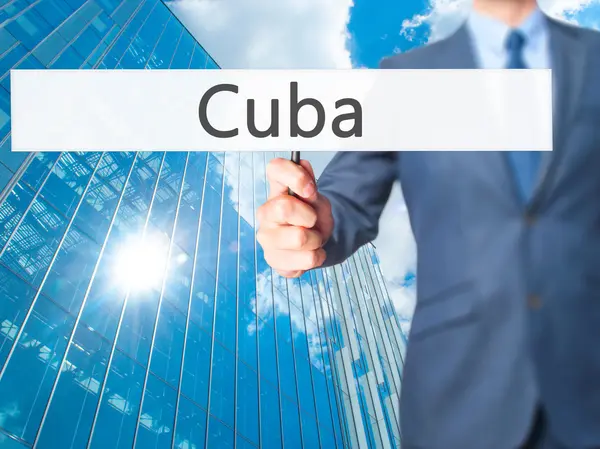 Kuba - biznesmen ręka trzyma znak — Zdjęcie stockowe