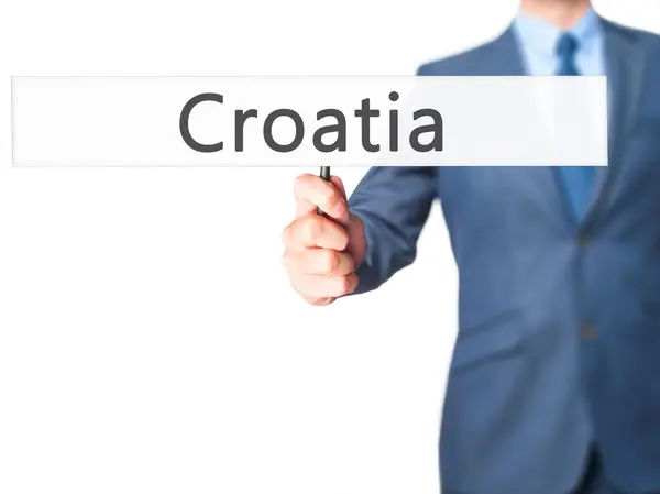 Croatie - Panneau de tenue de main d'homme d'affaires — Photo