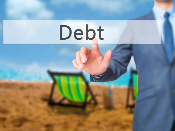Długu - biznesmen ręcznie, naciskając przycisk na ekranie dotykowym — Zdjęcie stockowe