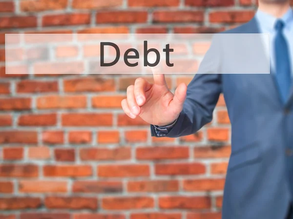 Dívida - Empresário mão pressionando botão na tela de toque — Fotografia de Stock
