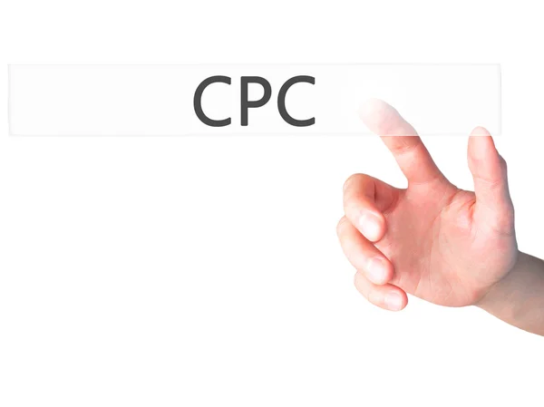 CPC - Mano presionando un botón sobre el concepto de fondo borroso en vi —  Fotos de Stock