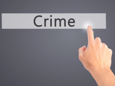 Suç - arka plan bulanık kavramı üzerinde bir düğmeye basarak el 