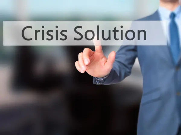 Решение Crisis - Businessman hand touch button on virtual scr — стоковое фото