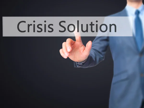 Решение Crisis - Businessman hand touch button on virtual scr — стоковое фото