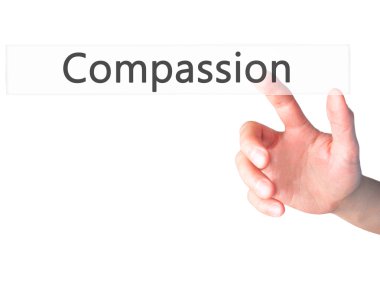 Şefkat - arka plan bulanık concep üzerinde bir düğmeye basarak el