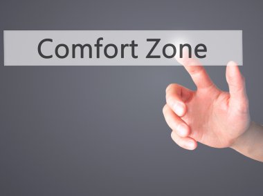 Comfort Zone - arka plan bulanık konsantrasyon üzerinde bir düğmeye basarak el
