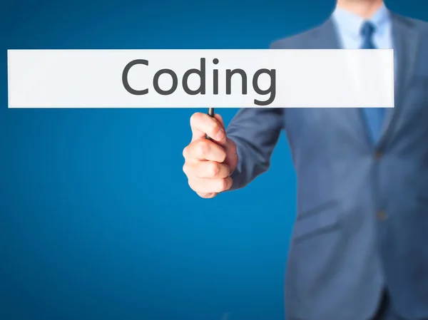 Coding - Uomo d'affari che mostra segno — Foto Stock