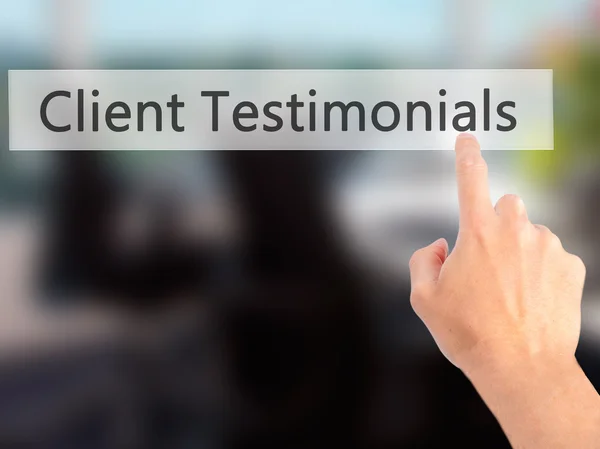 Client Testimonials - Hand pressing a button on blurred backgrou — Stock Photo, Image