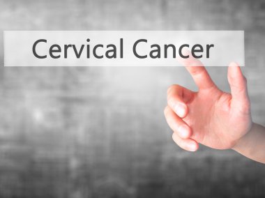 Cervical Cancer - Hand pressing a button on blurred background c clipart