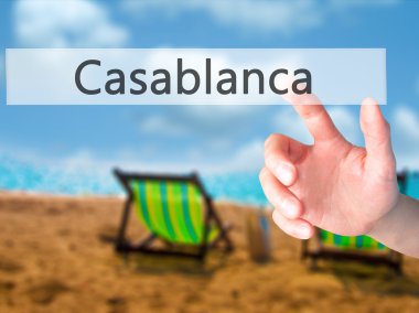 Casablanca - arka plan bulanık concep üzerinde bir düğmeye basarak el