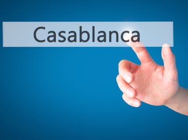 Casablanca - arka plan bulanık concep üzerinde bir düğmeye basarak el