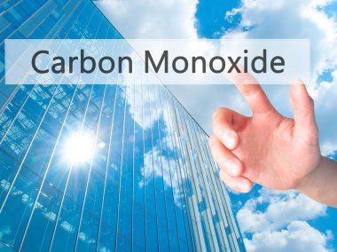 Karbon Monoksit - El bulanık arka plan c bir düğmeye basarak
