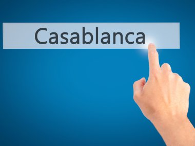 Casablanca - arka plan bulanık concep üzerinde bir düğmeye basarak el